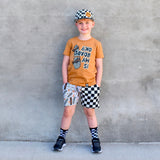Kids checkered snapback hat with embroidered smiley in orange