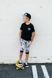 Kids snapback hat with embroidered smiley in white