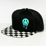 Black kids snapback hat with checkered brim and aqua drip smiley embroidery