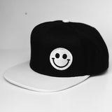 Kids snapback hat with embroidered smiley in white