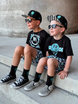 Black kids snapback hat with checkered brim and aqua drip smiley embroidery