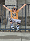 Kids checkered snapback hat with embroidered smiley in orange